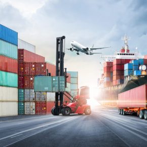 Business logistics and transportation concept of containers cargo freight ship and cargo plane in shipyard at dramatic blue sky, logistic import export and transport industry background